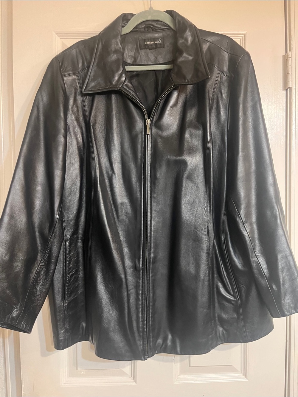 Classic Black Leather Jacket with cut on sleeve.